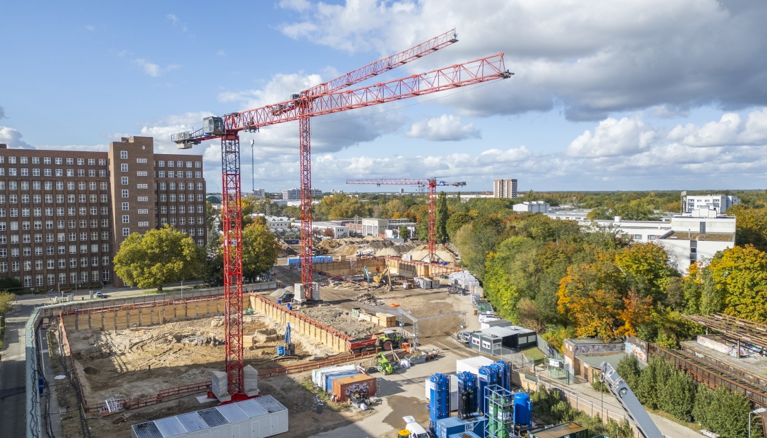 Baukräne-Bagger-Fortschritt